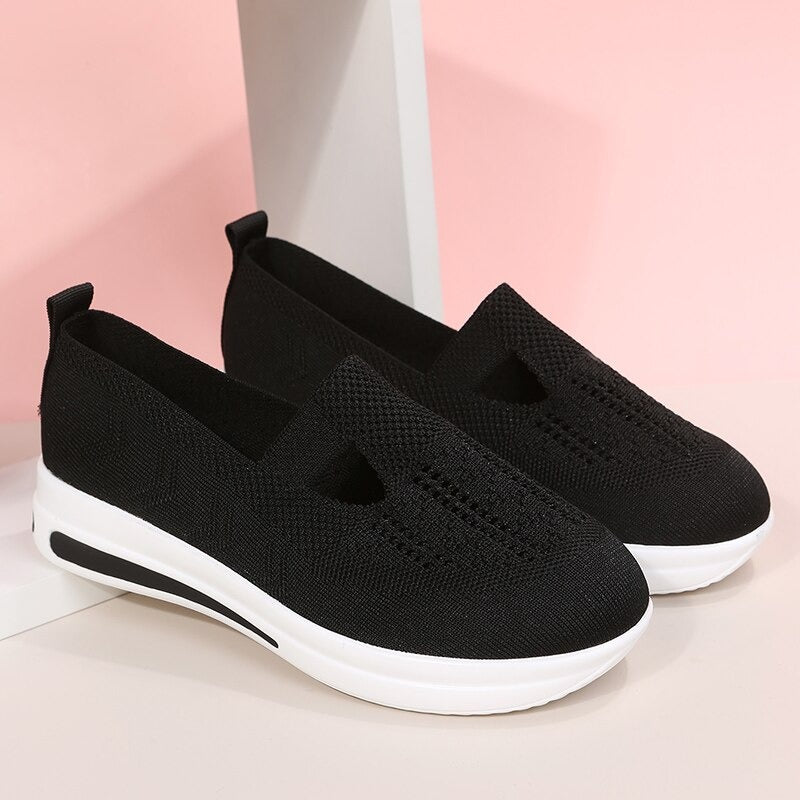 Scarpe sportive da donna con fondo spesso