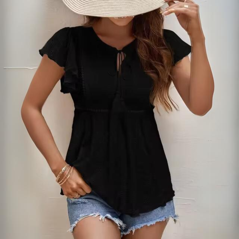 Chantal - Elegante top ricamato con nappe
