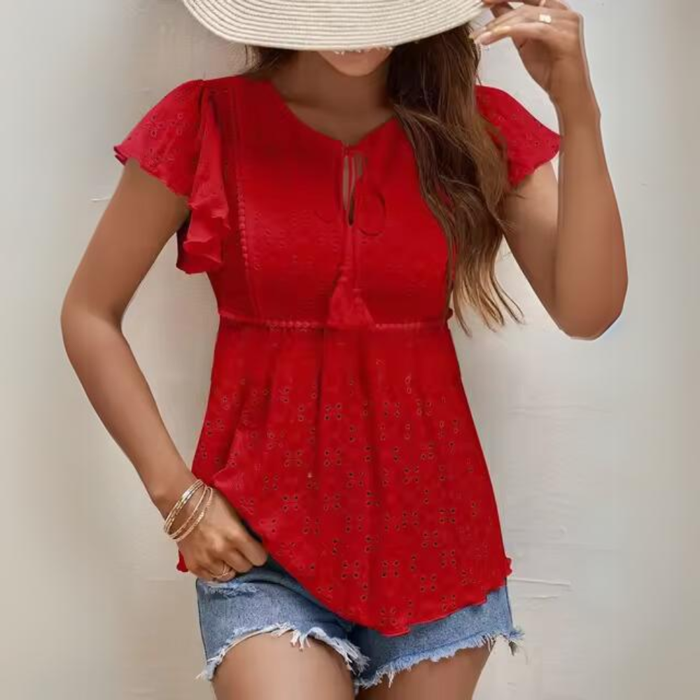 Chantal - Elegante top ricamato con nappe