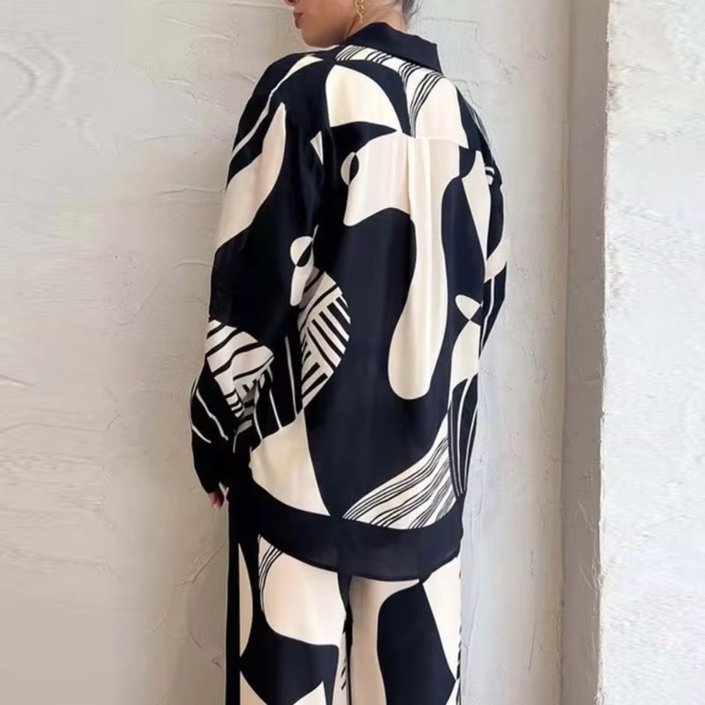 Edita - Top elegante, pantaloni larghi con gambe dritte